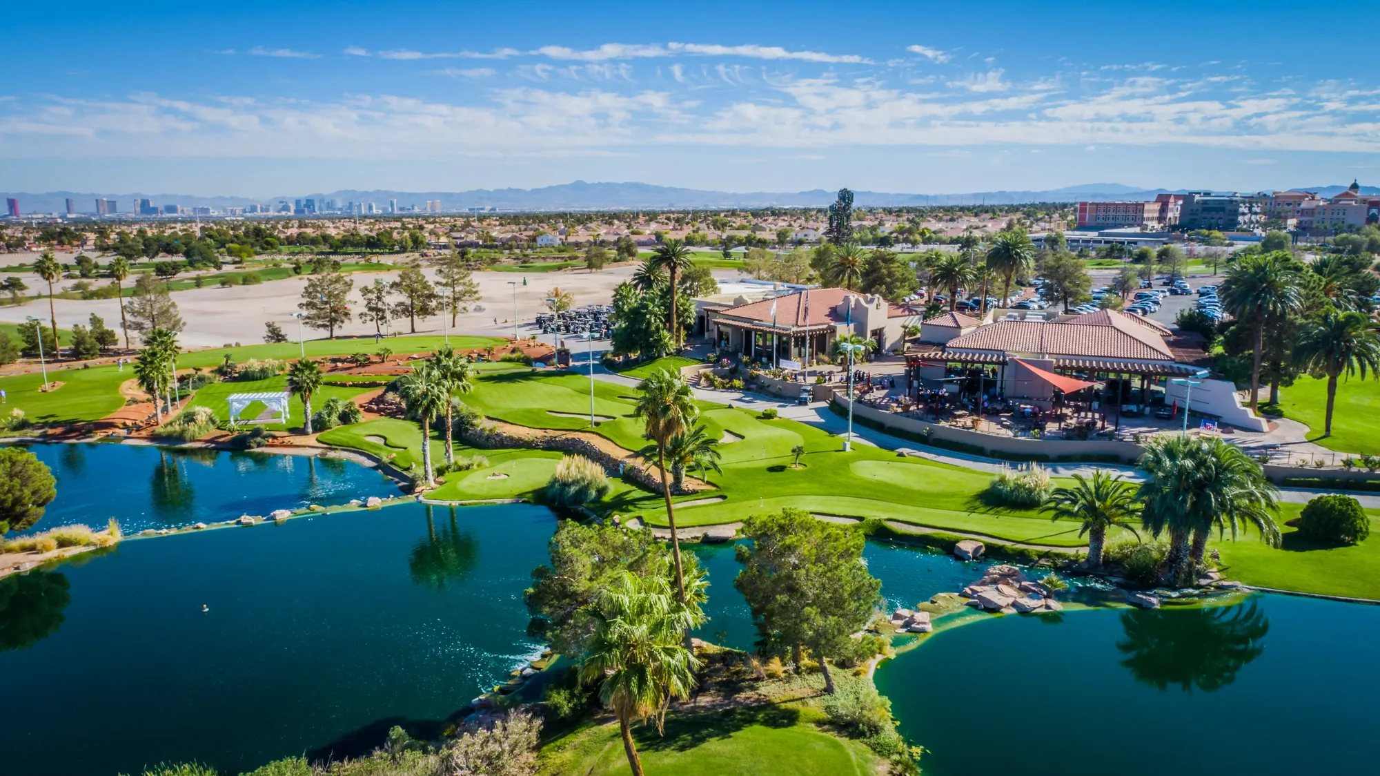 Angel Park Golf Club Las Vegas — Arnold Palmer design with island green and Strip skyline backdrop